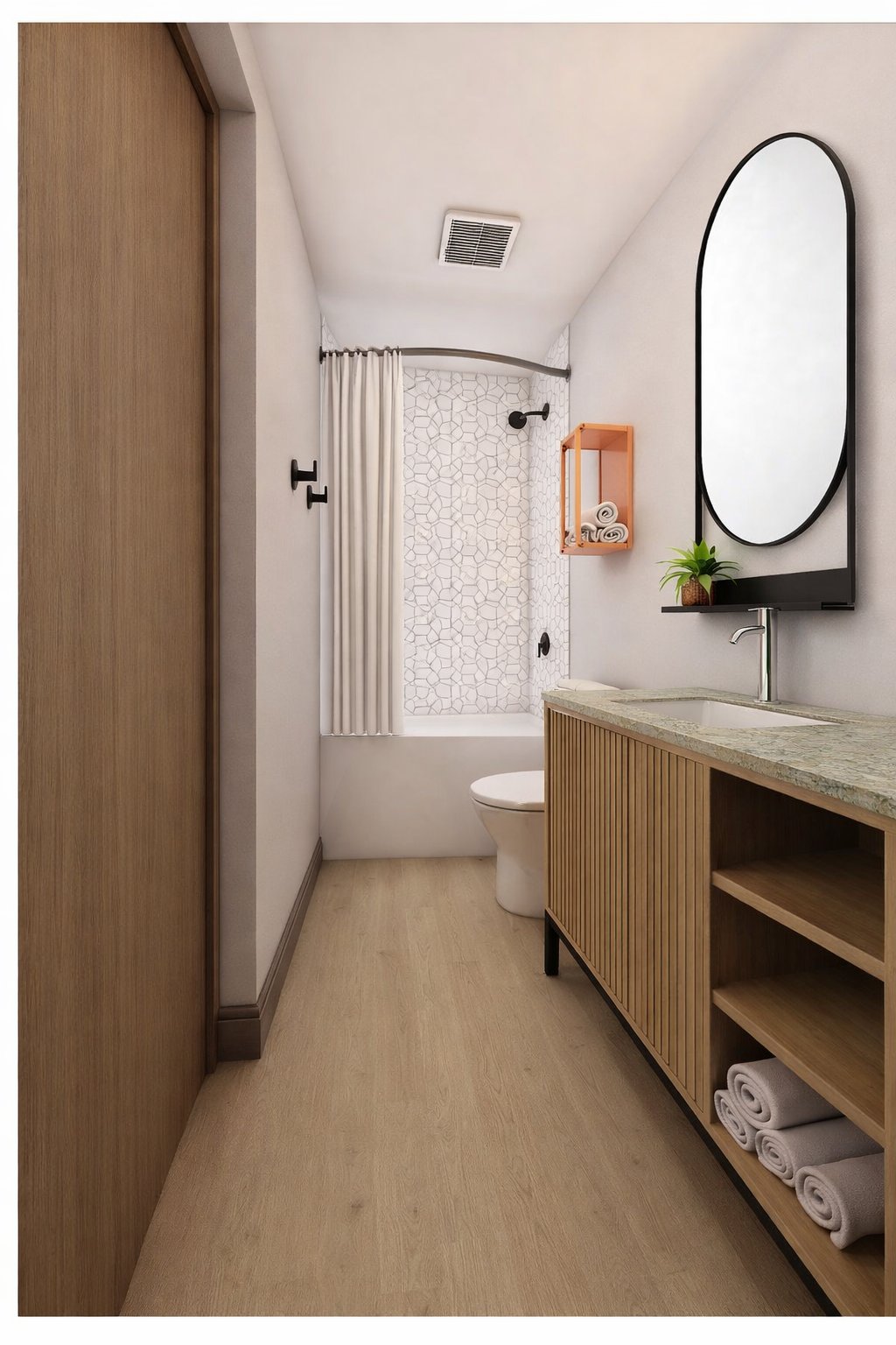 Guest bathroom with a patterned tile shower surround, oval mirror and floating wood vanity